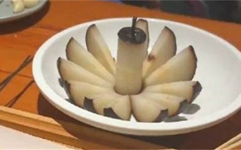 哈尔滨冻梨碰到南方游客变精致了 哈尔滨的冻梨怎么吃