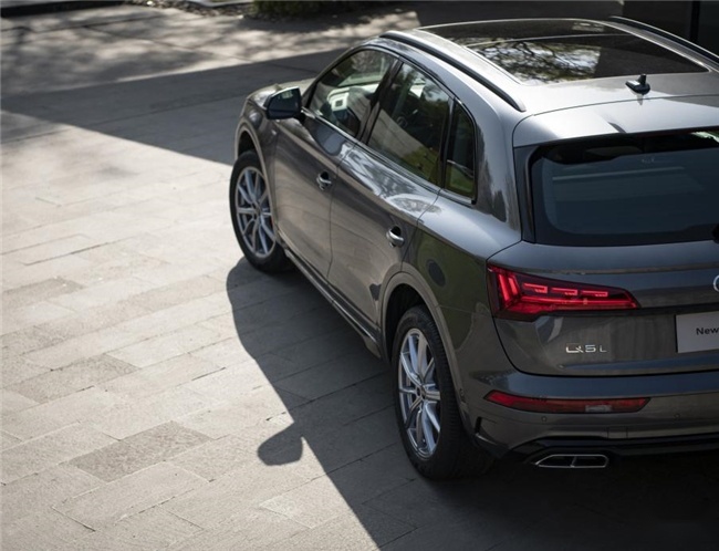 奥迪Q5L城市航行者，长沙暴雨中的安全守护者