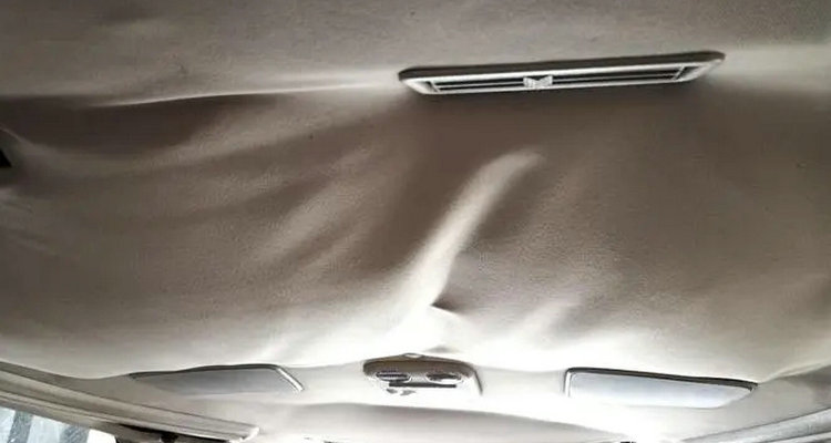 汽车顶棚布脱落怎么修复(汽车顶棚布脱落更换要多少钱)