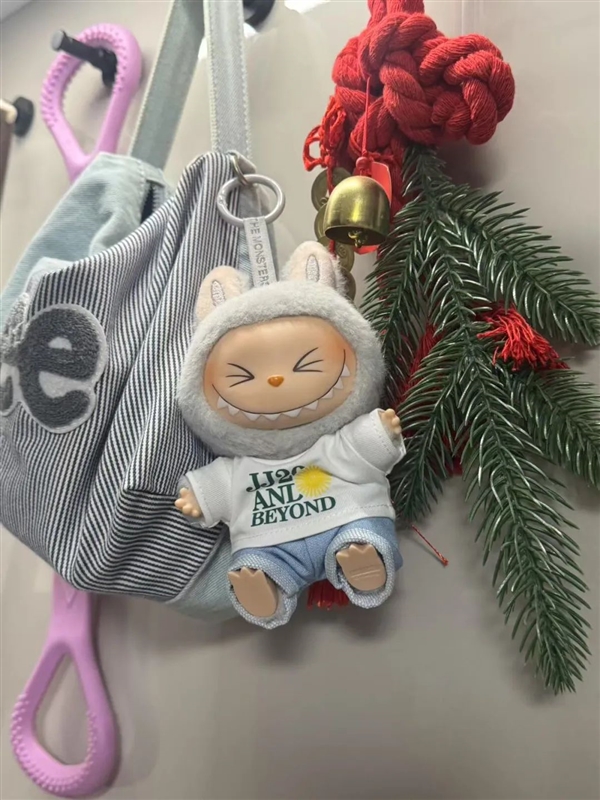 为什么好多人包上都要挂一个玩偶